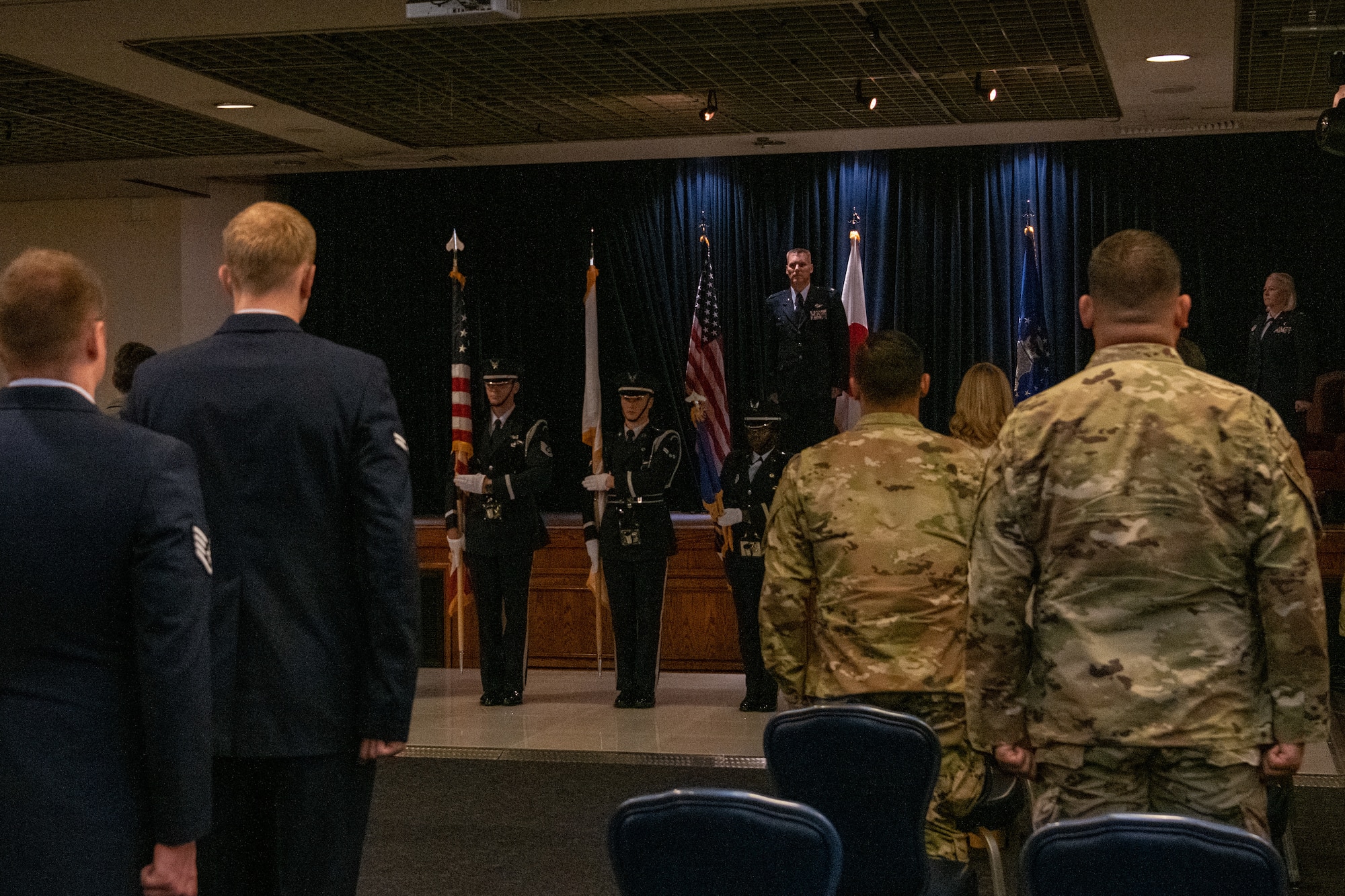 The Yokota Air Base Honor Guard presents the colors at the opening of a change of command ceremony