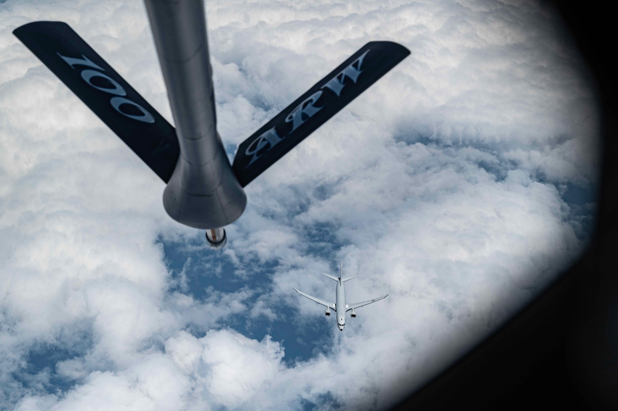 A U.S. Air Force KC-135 Stratotanker aircraft provides aerial refueling to a U.S. Navy P-8 Poseidon aircraft assigned to U.S. Air Naval Station Keflavik Base, Iceland, over the North Sea region, Royal Air Force Mildenhall, England, June 21, 2023. The 100th ARW is the sole air refueling wing across the European theater and provides critical support across Europe and Africa. (U.S. Air Force photo by Senior Airman Viviam Chiu)
