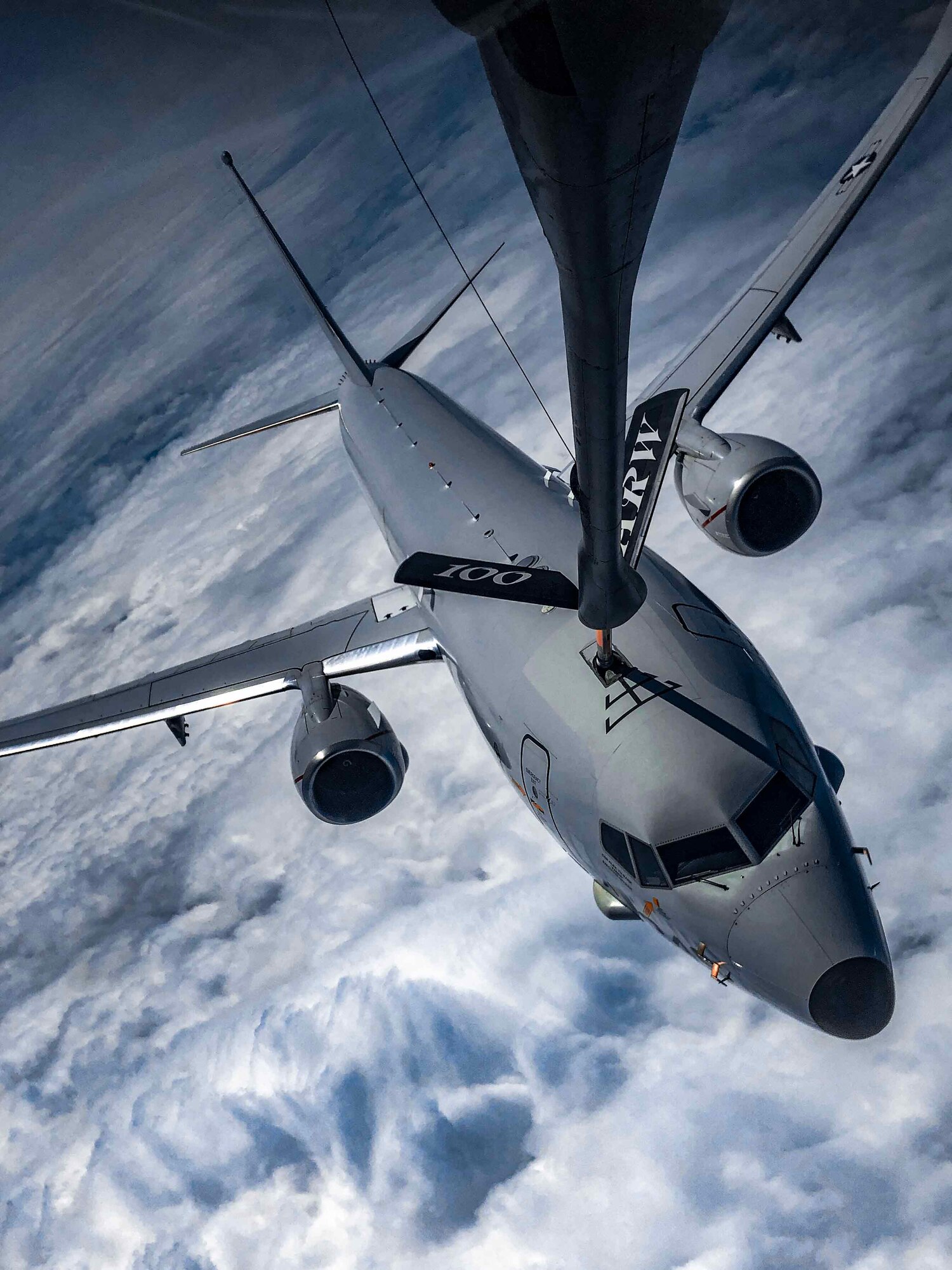 A U.S. Air Force KC-135 Stratotanker aircraft provides aerial refueling to a U.S. Navy P-8 Poseidon aircraft assigned to U.S. Air Naval Station Keflavik Base, Iceland, over the North Sea region, Royal Air Force Mildenhall, England, June 21, 2023. The 100th Air Refueling Wing is the sole permanent air refueling wing across the European theater that provides critical support across Europe and Africa. (U.S. Air Force photo by Senior Airman Viviam Chiu)