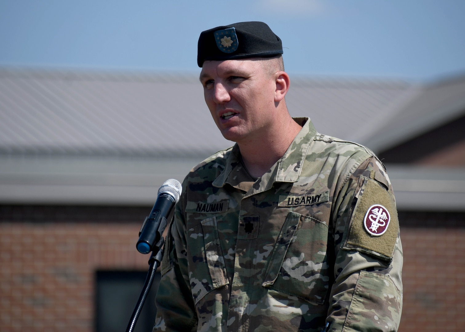 U.S. Army Lt. Col. Travis J. Nauman, the outgoing commander of the Soldier Recovery Unit – Fort Drum, speaks to attendees during the unit’s change of command ceremony at Fort Drum, N.Y., June 20, 2023.