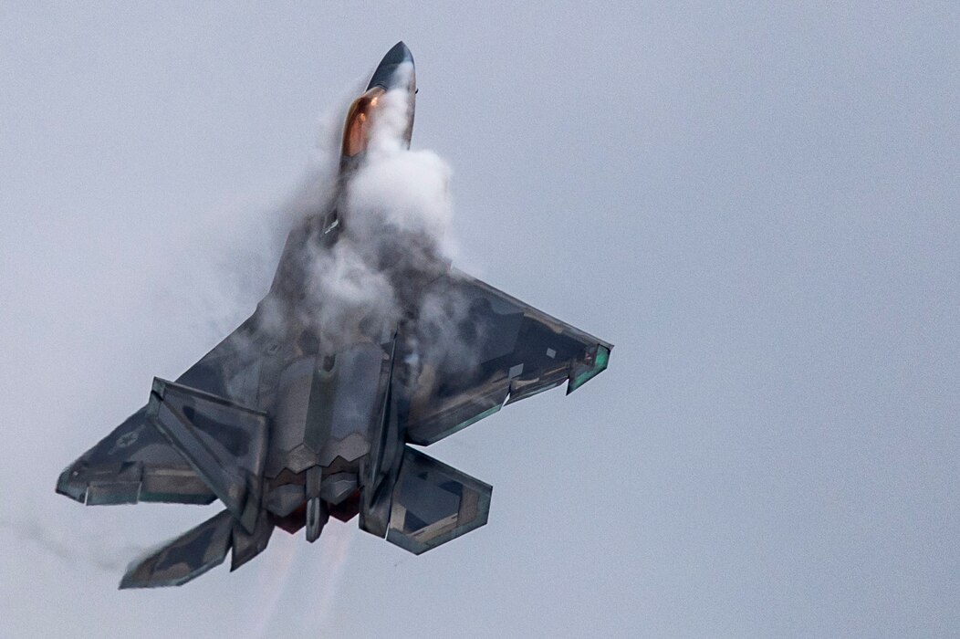 An F-22 Raptor from the F-22 Raptor Demo Team flies over Rickenbacker International Airport, Ohio,