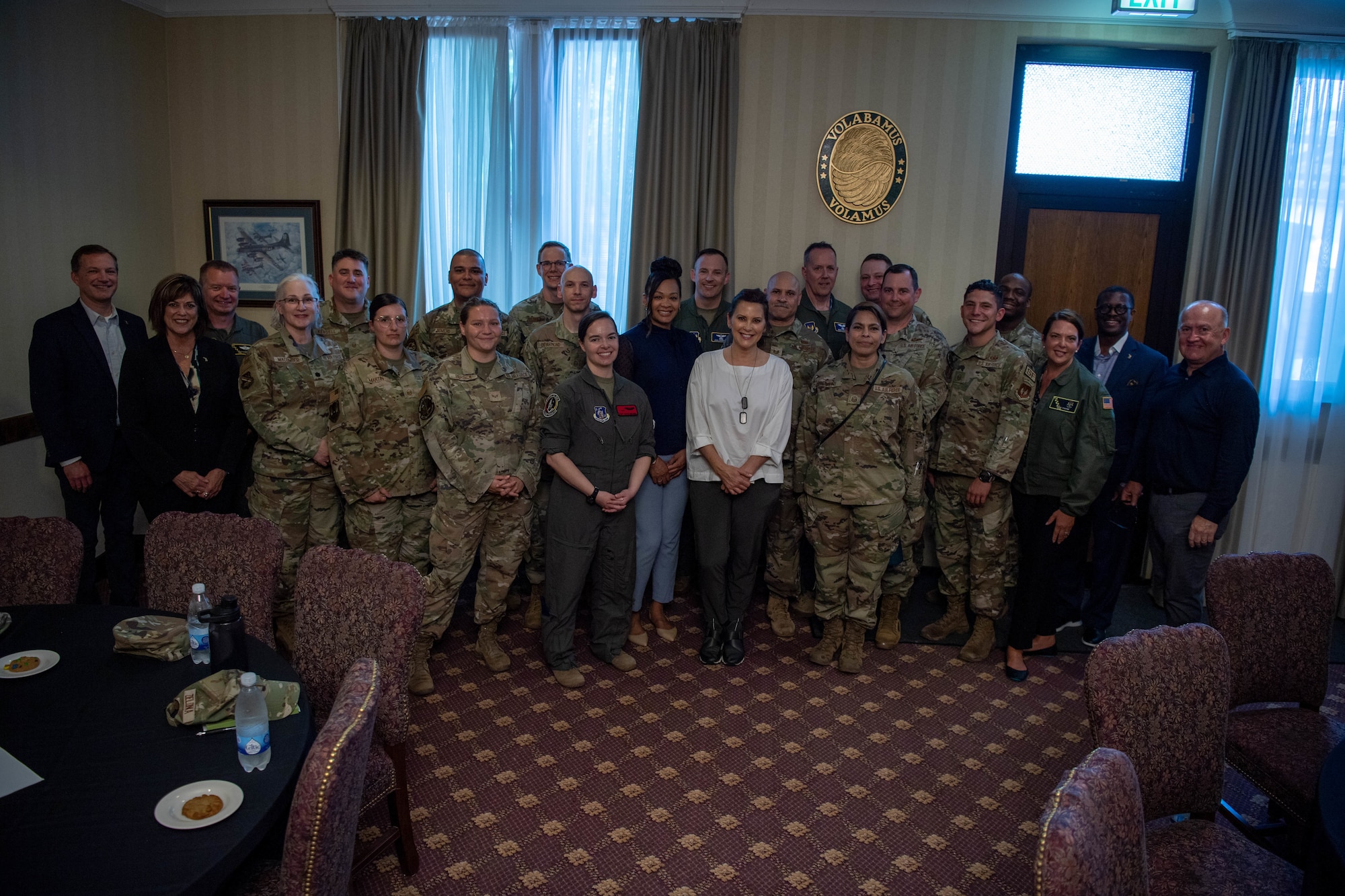 Michigan Gov. Gretchen Whitmer, front center, stands with attendees of a social event at Ramstein Air Base, Germany, June 22, 2023.