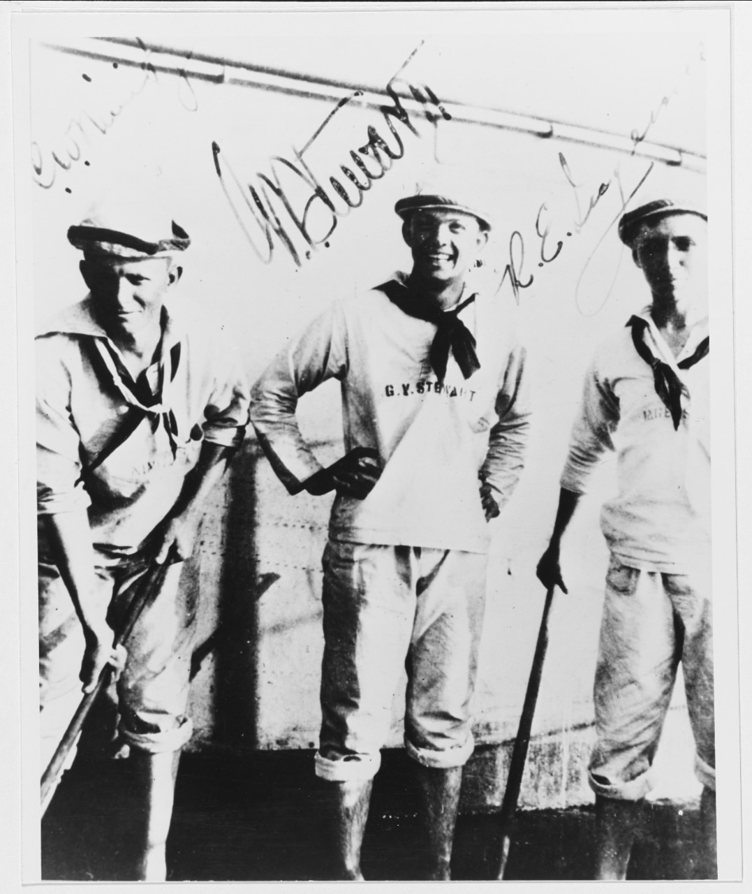 Midshipman Chester W. Nimitz (left), Midshipman G. V. Stewart (center), and Midshipman Royal E. Ingersoll aboard the battleship Indiana (BB-1) during their summer cruise of 1902.