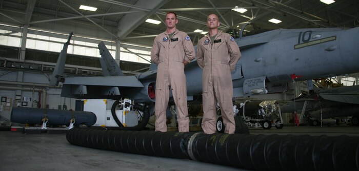 Capt. Brian Hansell  and Capt. Albert Garcia IV, both Marine Fighter Attack Squadron 122 F/A-18 Hornet pilots, passed the final requirements to receive the fighter attack instructor designation. The criteria for the designation was set forth by Marine Aviation and Weapons Tactics Squadron 1 and Marine Corps Training and Education Command.