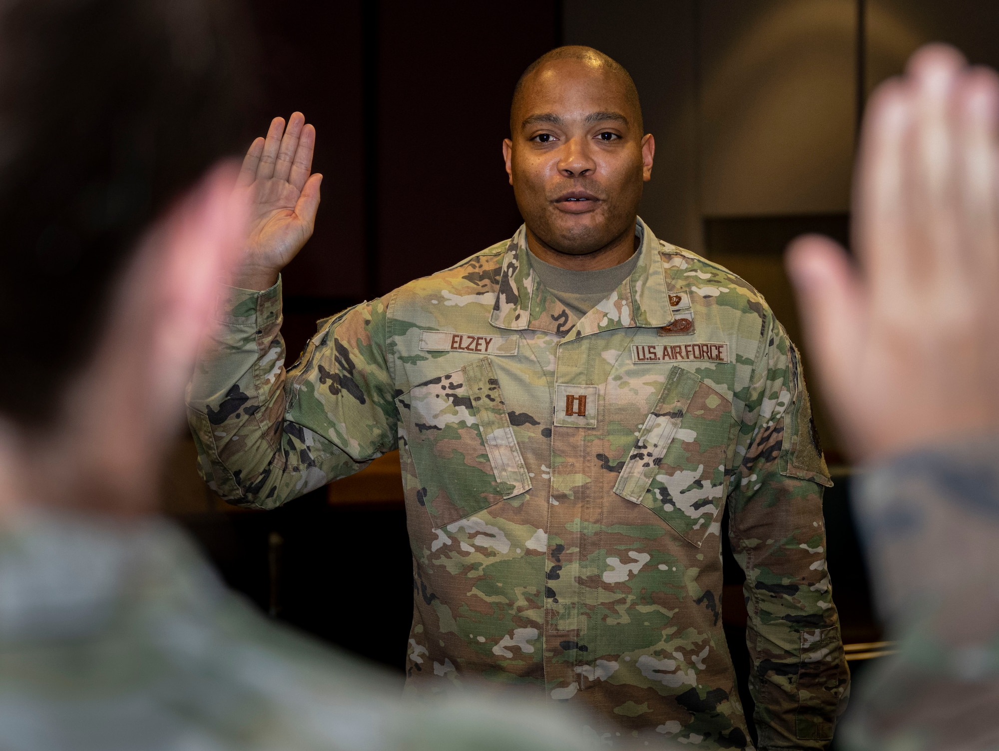 U.S. Air Force Capt. Gary Elzey, 4th Fighter Wing chief of litigation, swears in an individual during a mock trial at Seymour Johnson Air Force Base, North Carolina, June 21, 2023. The base legal office provides commanders with advice as to the best course of action from a legal perspective. (U.S. Air Force photo by Senior Airman David Lynn)