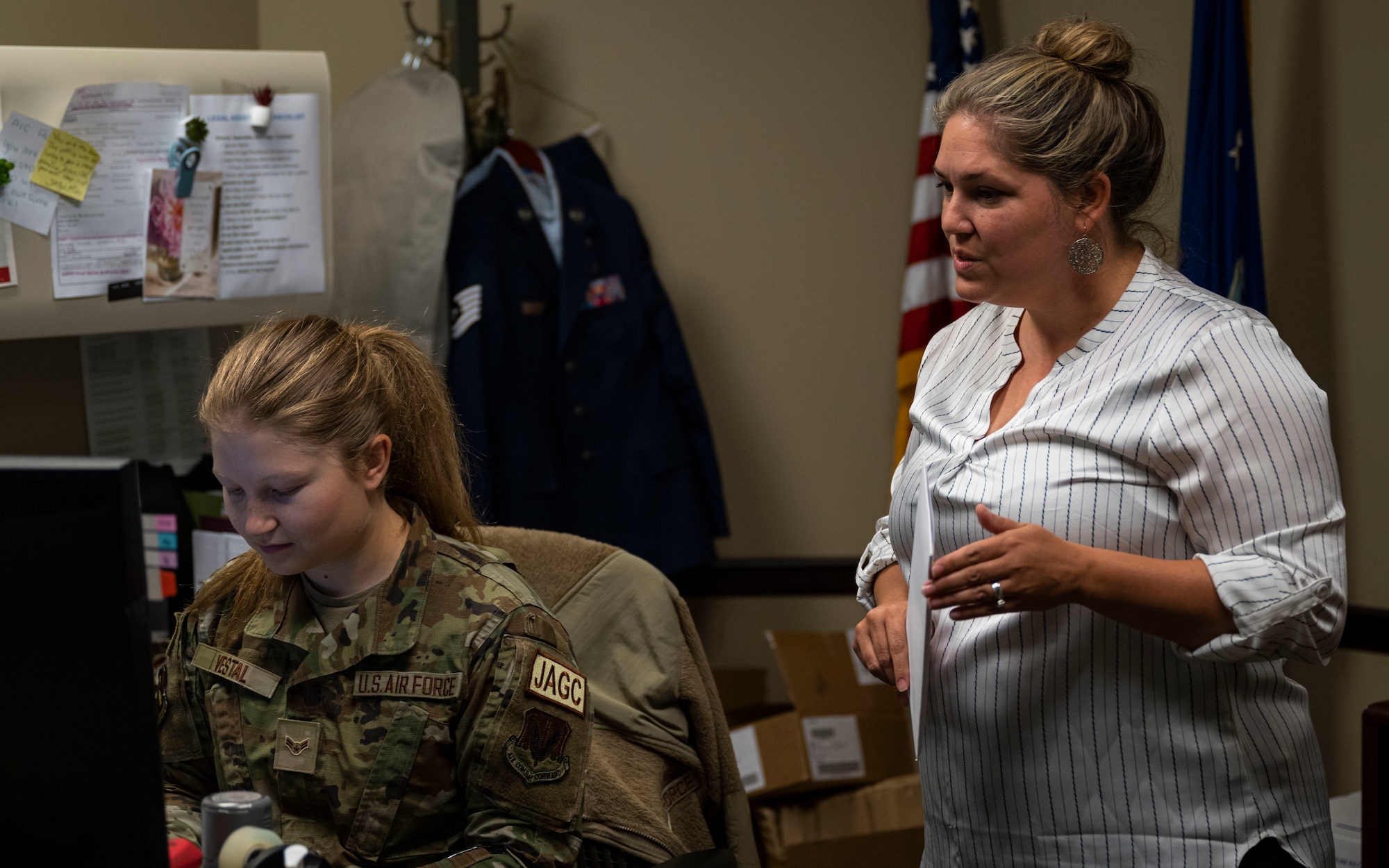 U.S. Airman 1st Class Abigail Vestal, left, 4th Fighter Wing judge advocate general corpsman, works with Ashley Gadd, 4th FW administrative discharge clerk, at Seymour Johnson Air Force Base, North Carolina, June 21, 2023. The Seymour Johnson legal office is broken into three sections, military justice, operations law and civil law. (U.S. Air Force photo by Senior Airman David Lynn)