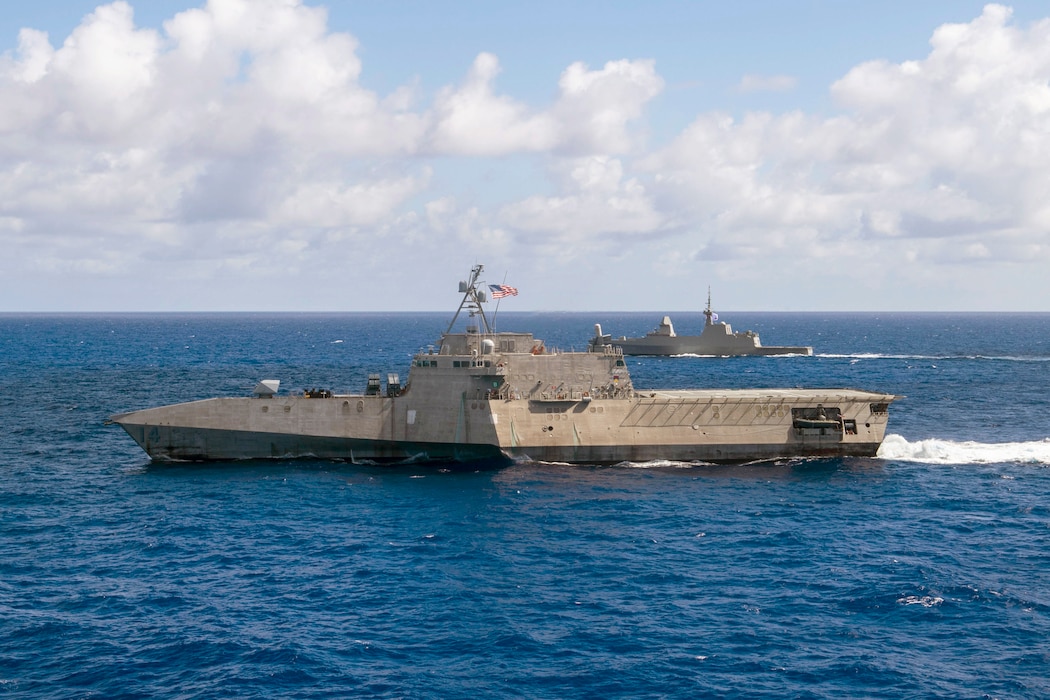 USS Manchester (LCS 14), front, and RSS Tenacious (71) transit the Philippine Sea during Exercise Pacific Griffin.