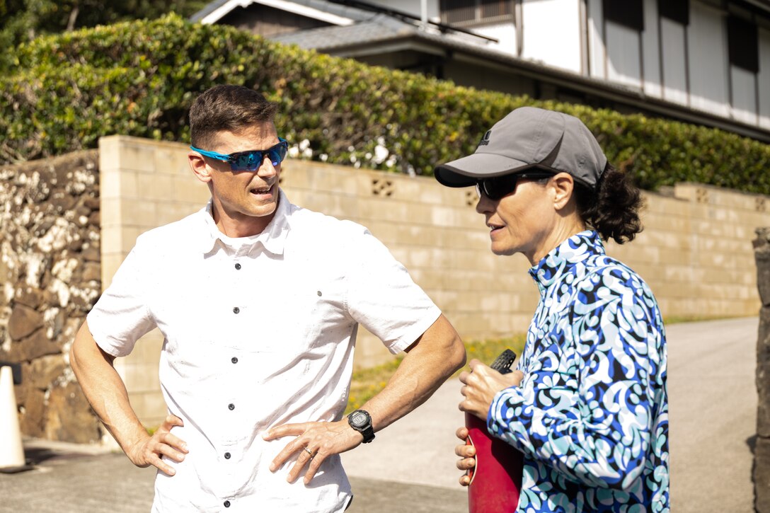 U.S. Marine Corps Col. Jeremy Beaven, left, commanding officer of Marine Corps Base Hawaii, meets with Rep. Lisa Marten, Hawaii House District 51, during a visit to the bordering fence line of Marine Corps Training Area Bellows and Kailua, Hawaii, May 15, 2023. The engagement provided MCBH leadership and elected officials an opportunity to address concerns from the local community in relation to future training and construction efforts. (U.S. Marine Corps photo by Cpl. Brandon Aultman)