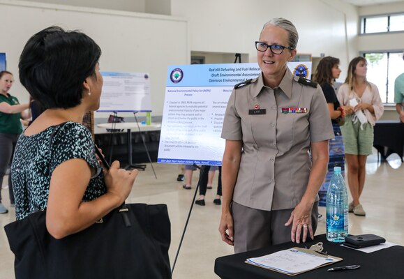 Joint Task Force-Red Hill (JTF-RH) Deputy Commander, U.S. Army Brig. Gen. Michelle Link, speaks with Hawaii State Representative, Linda Ichiyama, at JTF-RH’s National Environmental Policy Act (NEPA) Draft Environmental Assessment/Overseas Environmental Assessment (EA/OEA) Public Meeting at Ke’ehi Lagoon Memorial, Honolulu, Hawaii, June 15, 2023.