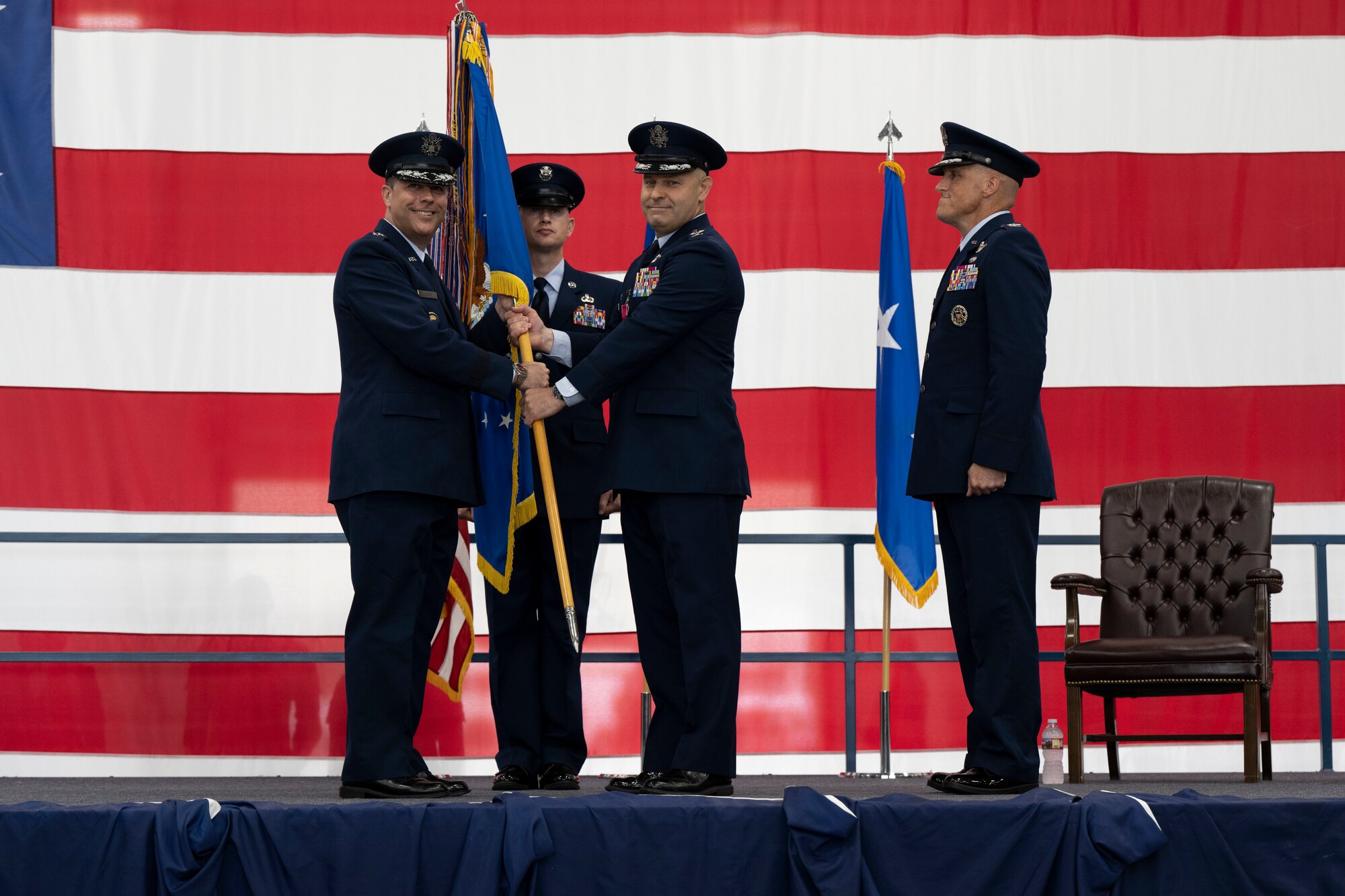 U.S. Air Force Maj. Gen. Andrew J. Gebara, Eighth Air Force and Joint-Global Strike Operations Center commander, left, relinquishes Col. Joseph L. Sheffield, outgoing 28th Bomb Wing commander, center, of his command at Ellsworth Air Force Base, South Dakota, June 23, 2023.
