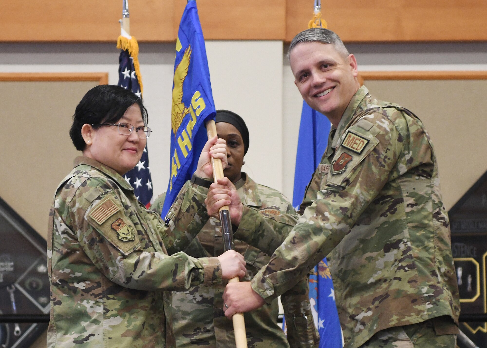 Lt. Col. Anthony Dargush, right, accepts command of the 341st Healthcare Operations Squadron from Col. Soo Sohn, 341st Medical Group commander, during a change of command ceremony June 12, 2023, at Malmstrom Air Force Base, Mont.