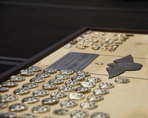A photo of a memorial plaque to Staff Sgt. Kory Wade