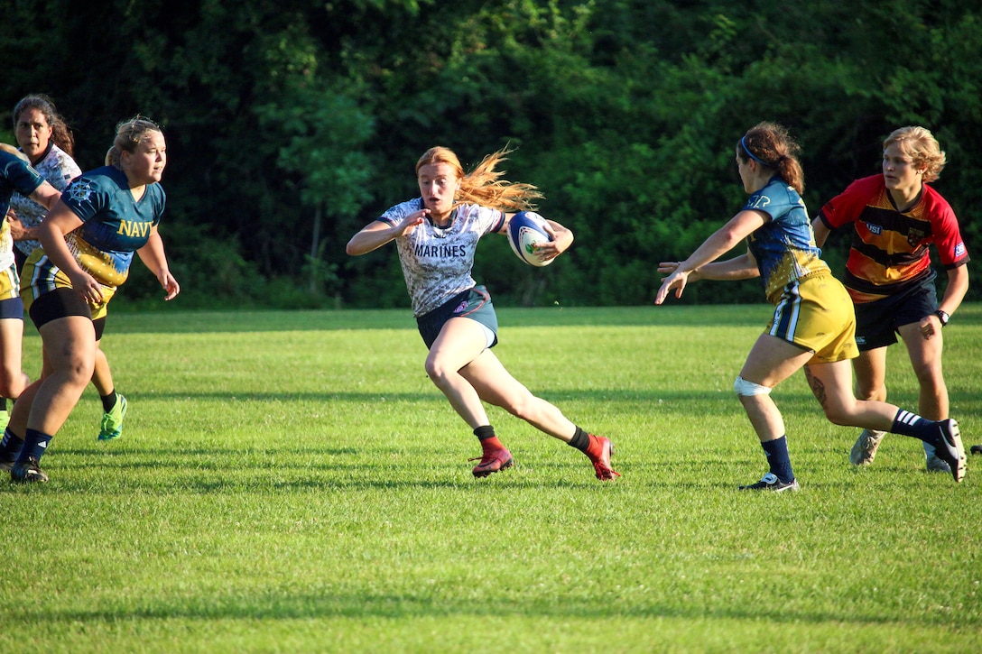 Lance Cpl Anastasia Schraff of MCAS Miramar, Calif. finds the seam for the try during Match 3 of the 2023 Armed Forces Sports Women's Rugby Championship held in conjunction with the Cape Fear 7's Rugby Tournament in Wilmington, N.C.  Championship features teams from the Army, Marine Corps, Navy, Air Force (with Space Force players), and Coast Guard.  (Dept. of Defense Photo by Mr. Steven Dinote, Released)