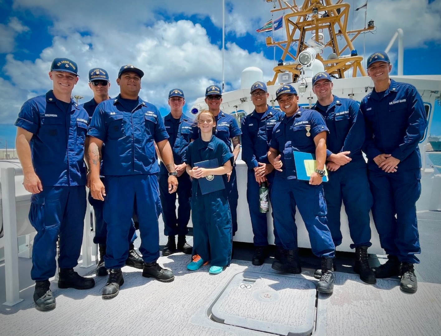 The crew of USCGC Myrtle Hazard (WPC 1139) recognize Edward "Kerc" Kamalo with a letter of appreciation and ship's coin during quarters aboard the ship in Guam on June 22, 2023.