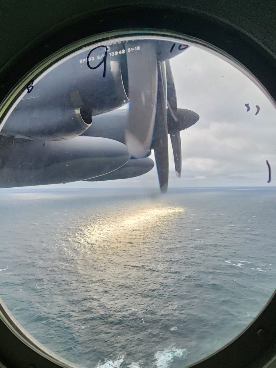The view from the window of an HC-130J Combat King II search and rescue aircraft 500 feet over the Atlantic Ocean June 21, 2023, while the New York Air National Guard crew searched for a submersible lost while diving to the wreck of the Titanic. The Coast Guard said June 22 that the sub imploded, killing all five people on board.