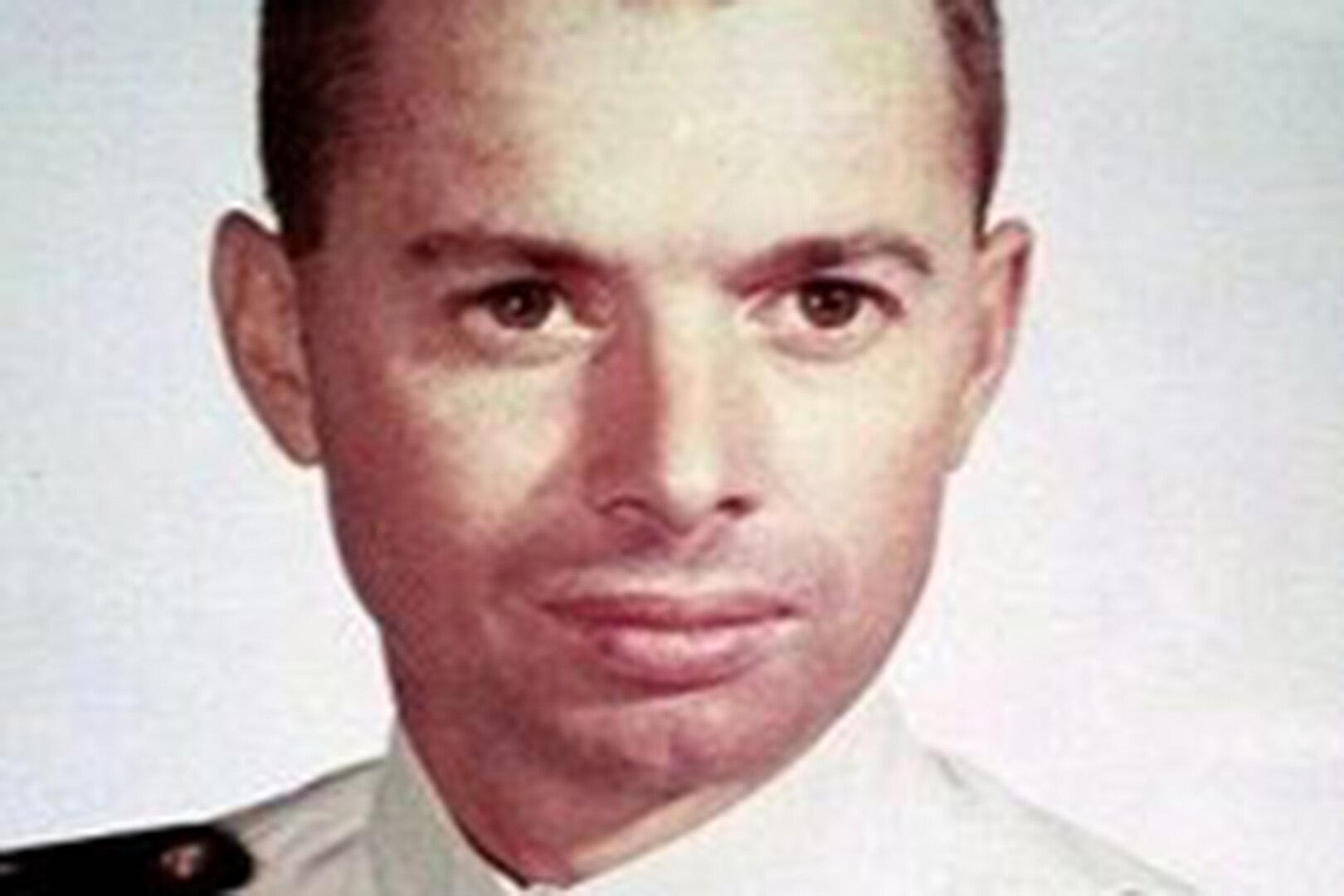 A male sailor poses for photo.