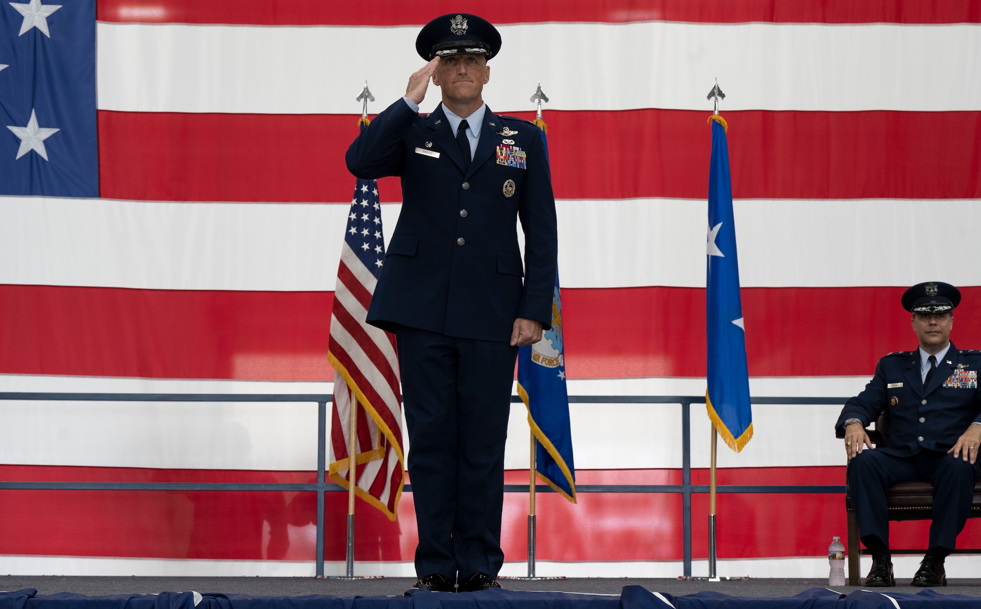 U.S. Air Force Col. Derek C. Oakley, incoming 28th Bomb Wing commander, renders his first salute as commander during a change of command ceremony at Ellsworth Air Force Base, South Dakota, June 23, 2023.