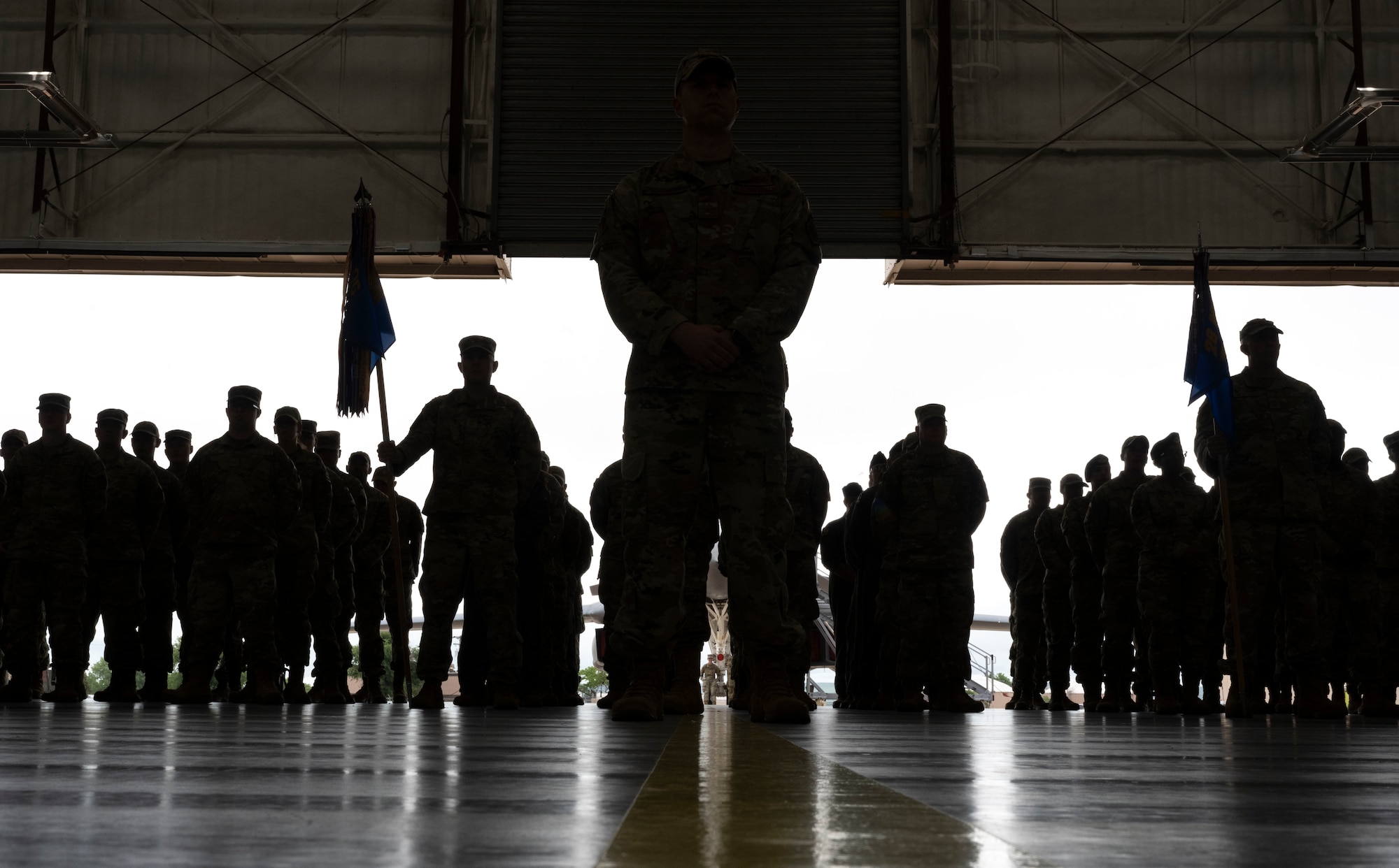 Airmen assigned to the 28th Bomb Wing stand in formation during a change of command ceremony at Ellsworth Air Force Base, South Dakota, June 23, 2023.