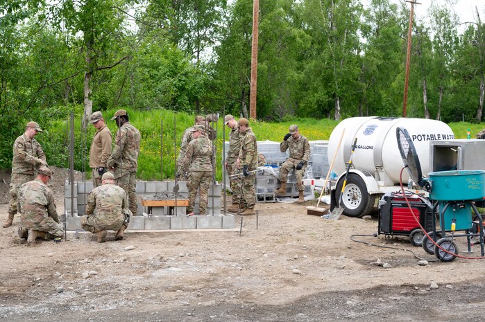 U.S. Air Force Airmen of the 673d Civil Engineer Squadron construct a guard outpost at Camp Mad Bull at Joint Base Elmendorf-Richardson, Alaska.