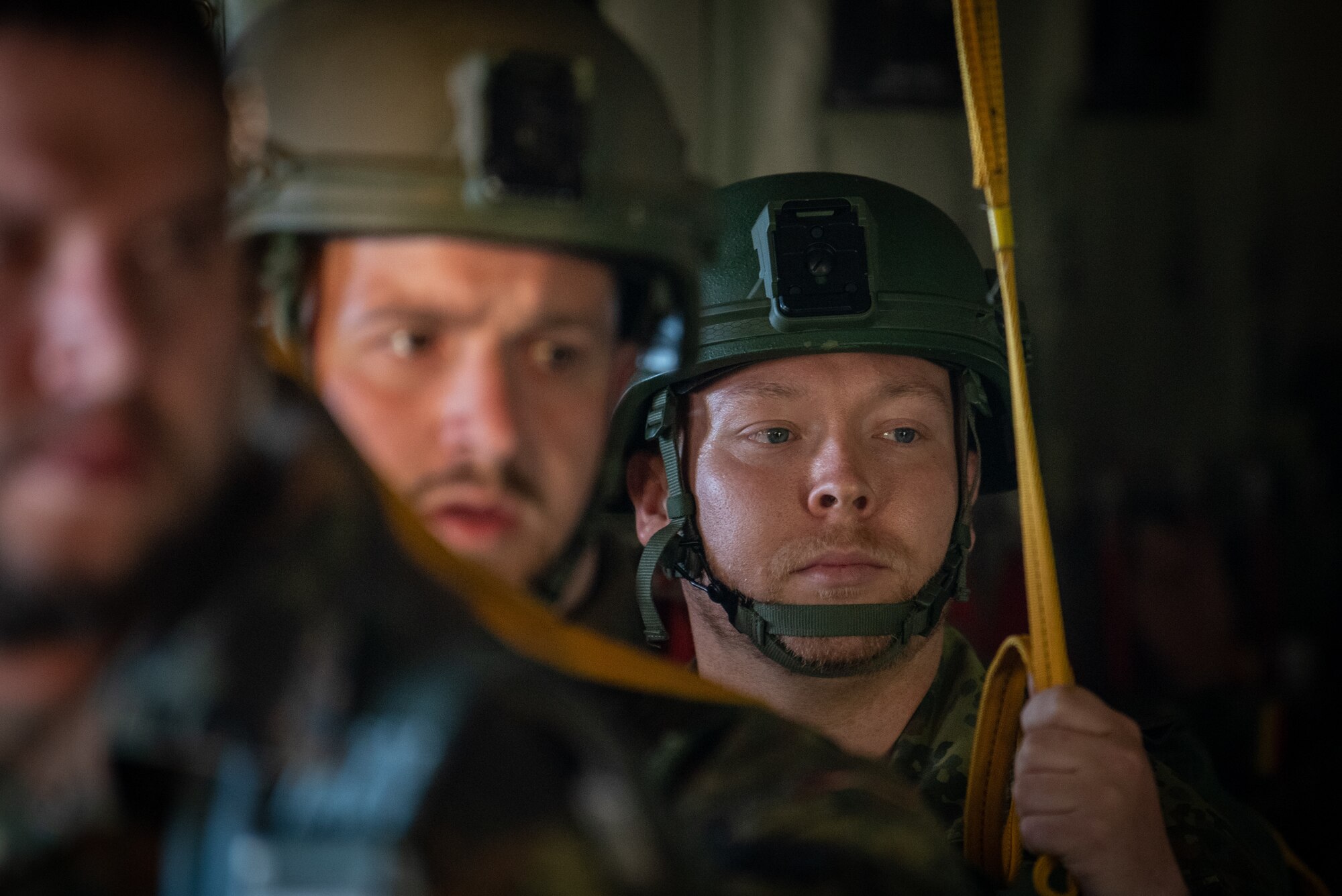 German paratroopers prepare to jump from a 123rd Airlift Wing C-130J Super Hercules during exercise Air Defender 2023 in Saarbrucken, Germany, June 15, 2023. AD23 integrates both U.S. and allied air-power to defend shared values, while leveraging and strengthening vital partnerships to deter aggression around the world. (U.S. Air National Guard photo by Master Sgt. Phil Speck)