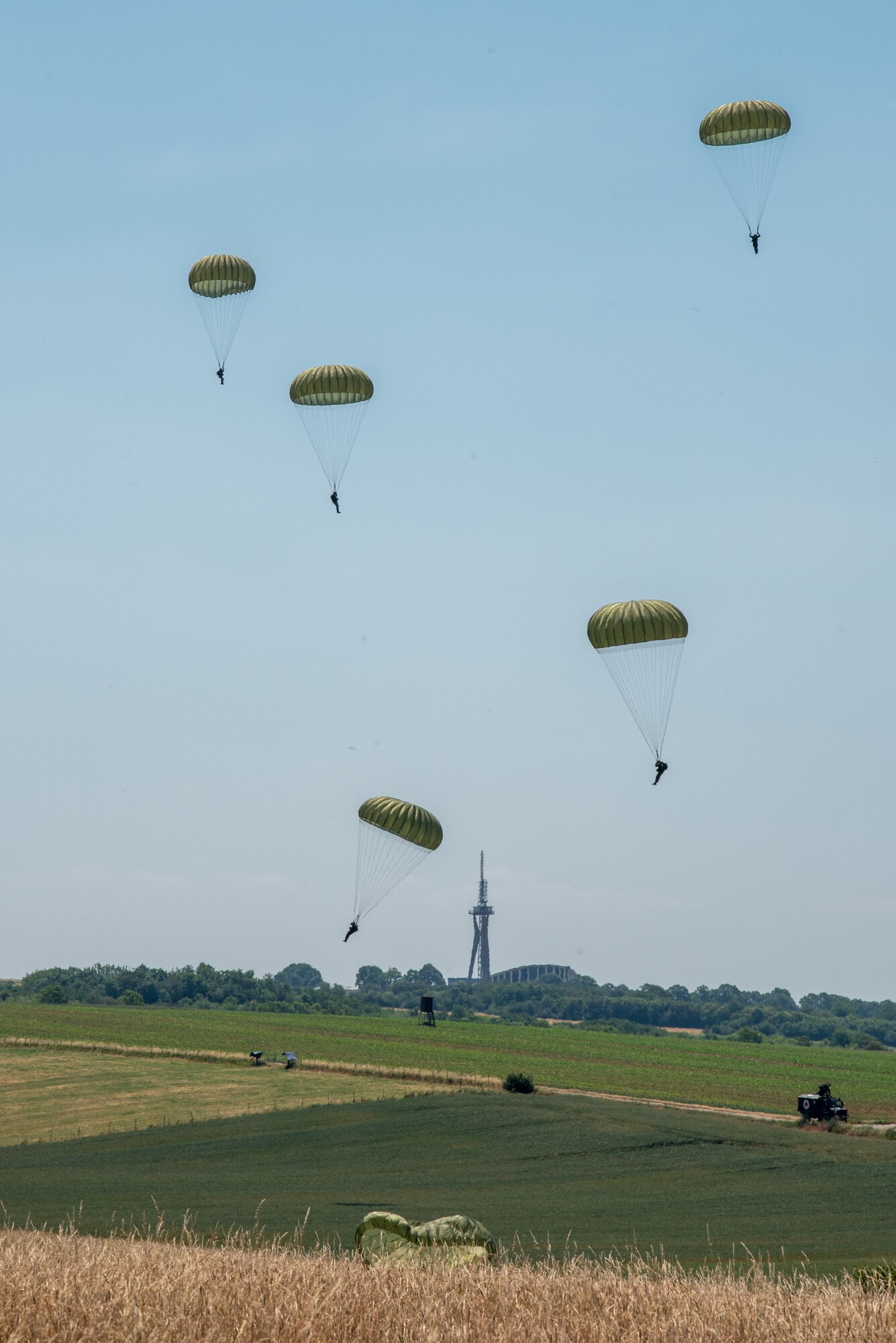 German paratroopers descend from the sky during exercise Air Defender 2023 (AD23) in Saarbrucken, Germany, June 14, 2023. Exercise AD23 integrates both U.S. and allied air-power to defend shared values, while leveraging and strengthening vital partnerships to deter aggression around the world. (U.S. Air National Guard photo by Master Sgt. Phil Speck)