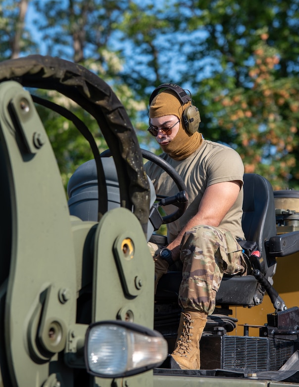 A U.S. Airman with the 156th Wing, Puerto Rico National Guard, begins forklift operations to unload cargo in preparation for exercise Air Defender 2023 (AD23) at Wunstorf Air Base, Germany, June 1, 2023. Exercise AD23 integrates both U.S and allied air-power to defend shared values, while leveraging and strengthening vital partnerships to deter aggression around the world. (U.S. Air National Guard photo by Senior Master Sgt. Vicky Spesard)