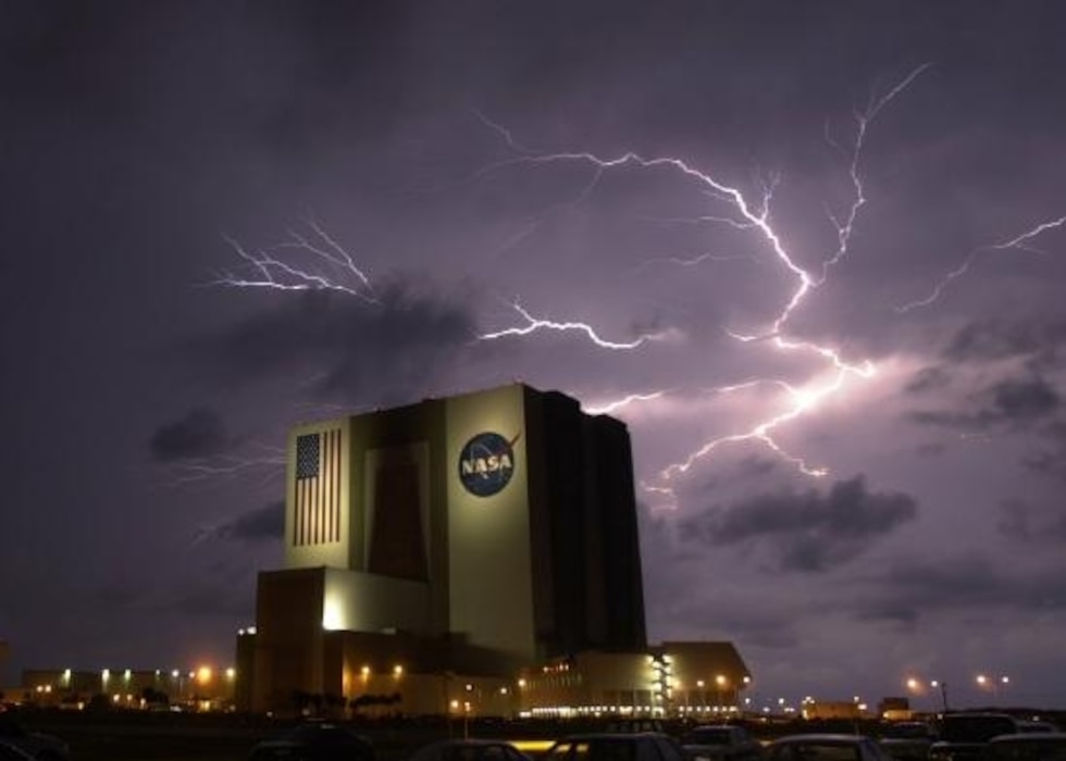 Lightning strikes above the Vehicle Assembly Building at Kennedy Space Center, Fla., May 30, 2002. The corridor from Tampa Bay to Titusville, FL, (a.k.a "Lightning Alley") receives the most lightning in the U.S. on an annual basis.