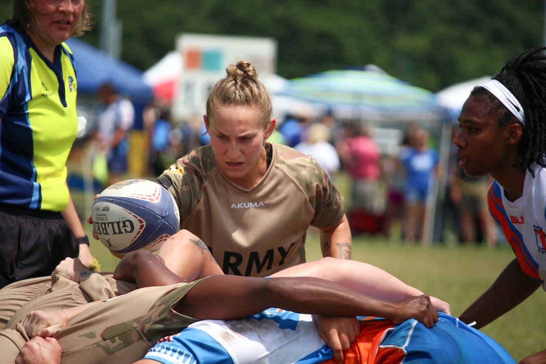 Army in the scrum during their match against Coast Guard during the 2023 Armed Forces Sports Women's Rugby Championship held in conjunction with the Cape Fear 7's Rugby Tournament in Wilmington, N.C.  Championship features teams from the Army, Marine Corps, Navy, Air Force (with Space Force players), and Coast Guard.  (Dept. of Defense Photo by Mr. Steven Dinote, Released)
