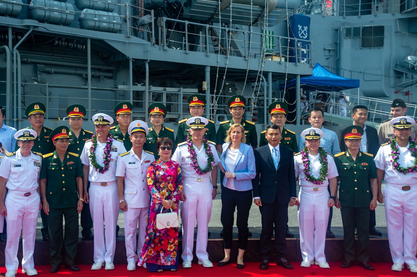 DA NANG, Vietnam (June 25, 2023) – Rear Adm. Pat Hannifin, center, commander, Task Force 70/Carrier Strike Group 5, poses for a photo with strike group leadership and Vietnamese military officers during an arrival ceremony for the U.S. Navy’s only forward-deployed carrier, USS Ronald Regan (CVN 76), carrier strike group (CSG) in Da Nang, Vietnam June 25, 2023. This marks Ronald Reagan’s first visit to the country since diplomatic relations were re-established. Ronald Reagan CSG is forward-deployed to the 7th Fleet area of operation in support of a free and open Indo-Pacific. (U.S. navy photo by Mass Communication Specialist 2nd Class Askia Collins)