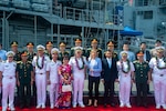 DA NANG, Vietnam (June 25, 2023) – Rear Adm. Pat Hannifin, center, commander, Task Force 70/Carrier Strike Group 5, poses for a photo with strike group leadership and Vietnamese military officers during an arrival ceremony for the U.S. Navy’s only forward-deployed carrier, USS Ronald Regan (CVN 76), carrier strike group (CSG) in Da Nang, Vietnam June 25, 2023. This marks Ronald Reagan’s first visit to the country since diplomatic relations were re-established. Ronald Reagan CSG is forward-deployed to the 7th Fleet area of operation in support of a free and open Indo-Pacific. (U.S. navy photo by Mass Communication Specialist 2nd Class Askia Collins)