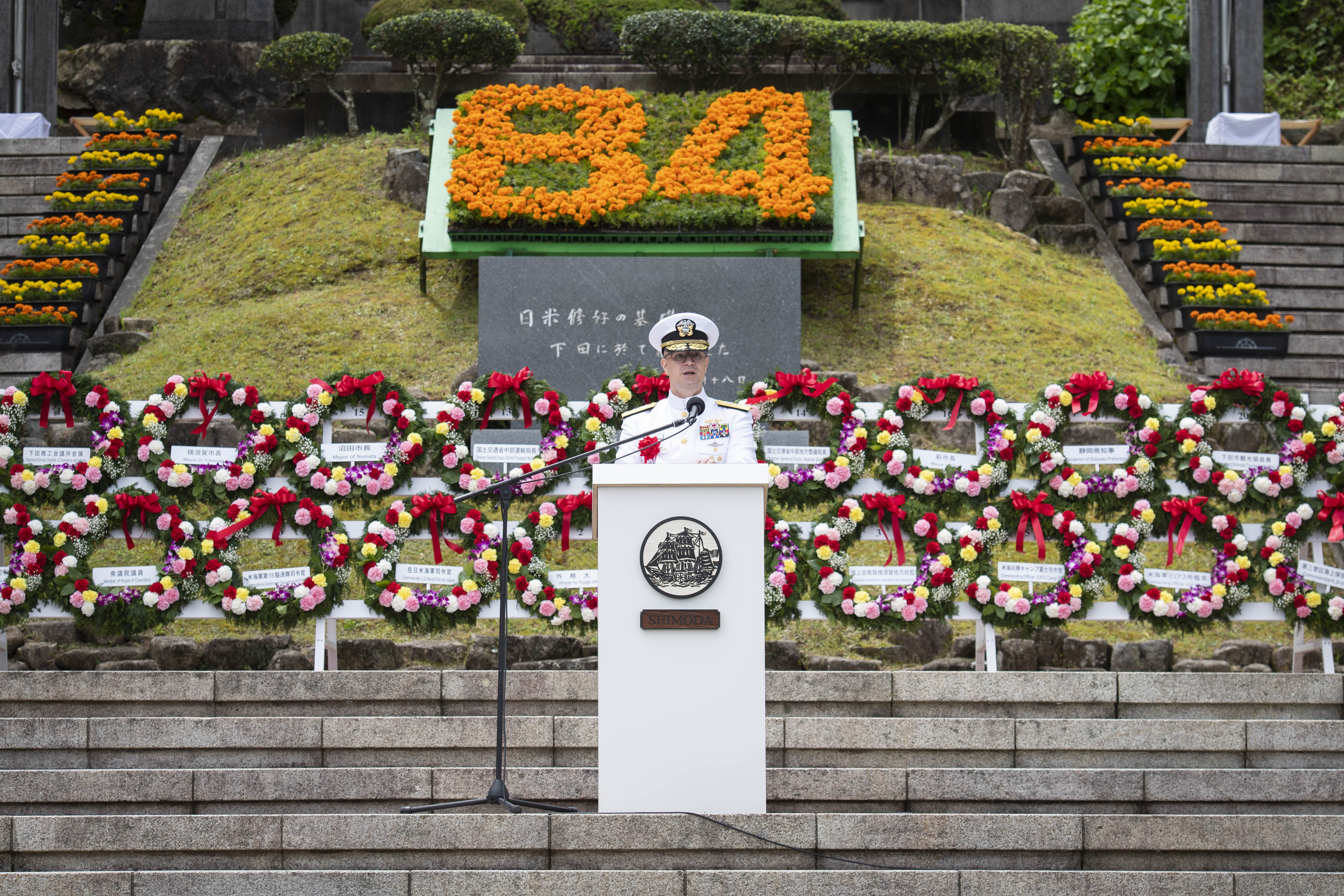 Rear Adm. Carl Lahti, delivers an address during the official ceremony for the 84th Annual Shimoda Black Ship Festival at Shimoda Park.