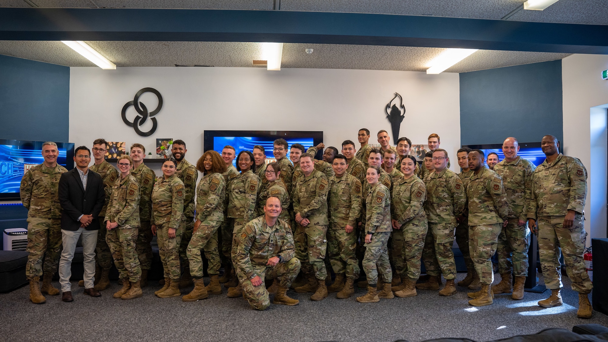 The Liberty Wing HOPE specialists and leadership pose for a group photograph on Royal Air Force Lakenheath, England, March, 9, 2023. The HOPE specialists' mission is to create a movement of Airmen dedicated to spiritual fitness, resilience, character and community service. (U.S. Air Force photo by Airman 1st Class Seleena Muhammad-Ali)