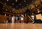 Graduates walking across stage