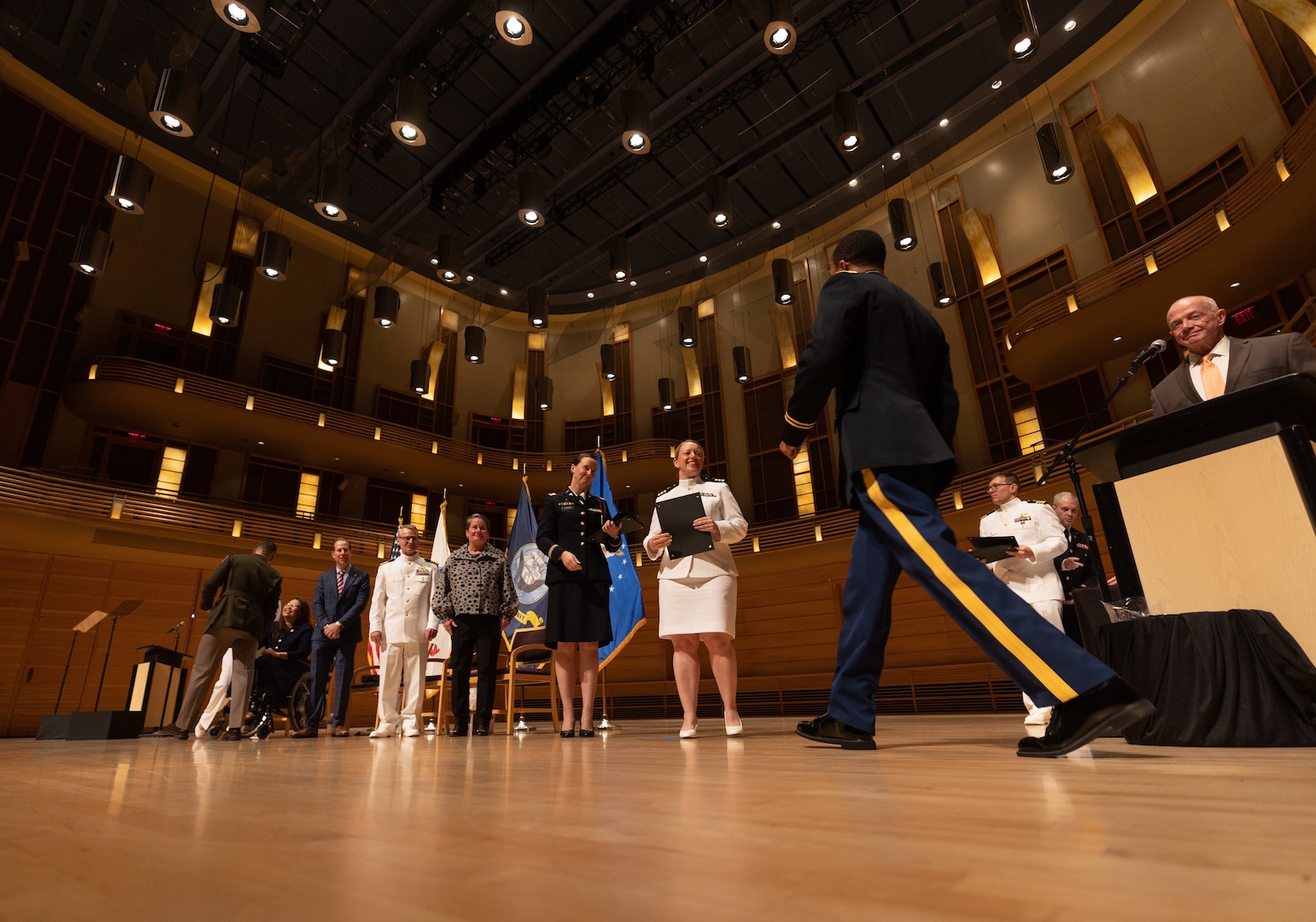 Graduates walking across stage