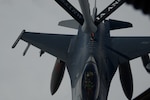 A U.S. Air Force F-16 Falcon from the South Dakota Air National Guard’s 114th Fighter Wing based in Sioux Falls receives fuel while in flight from a U.S. Air Force KC-135 assigned to the Iowa Air National Guard’s 185th Air Refueling Wing based in Sioux City while flying over South Dakota March 19, 2019.