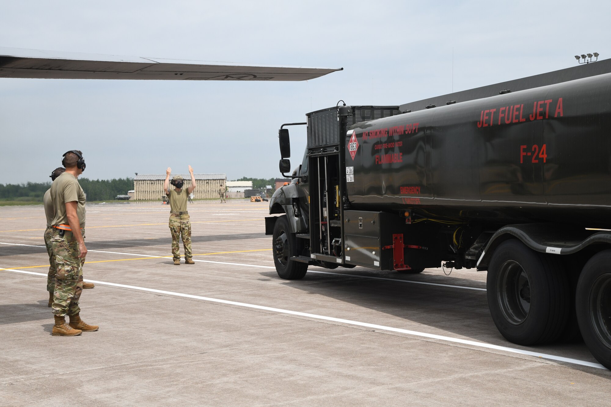 U.S. Air Force Fuels Specialists from the 133rd Airlift Wing, Minnesota Air National Guard, conduct a wet-wing defueling mission at the 148th Fighter Wing, Duluth, Minnesota on June 6, 2023.