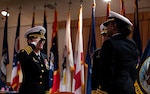 Capt. Melissa C. Austin, left, the first commanding officer of Navy Medicine Readiness and Training Command (NMRTC) Fort Belvoir is relieved by Capt. Tracey R. Giles during a change of command ceremony at the Woodlawn Chapel onboard Fort Belvoir June 23.