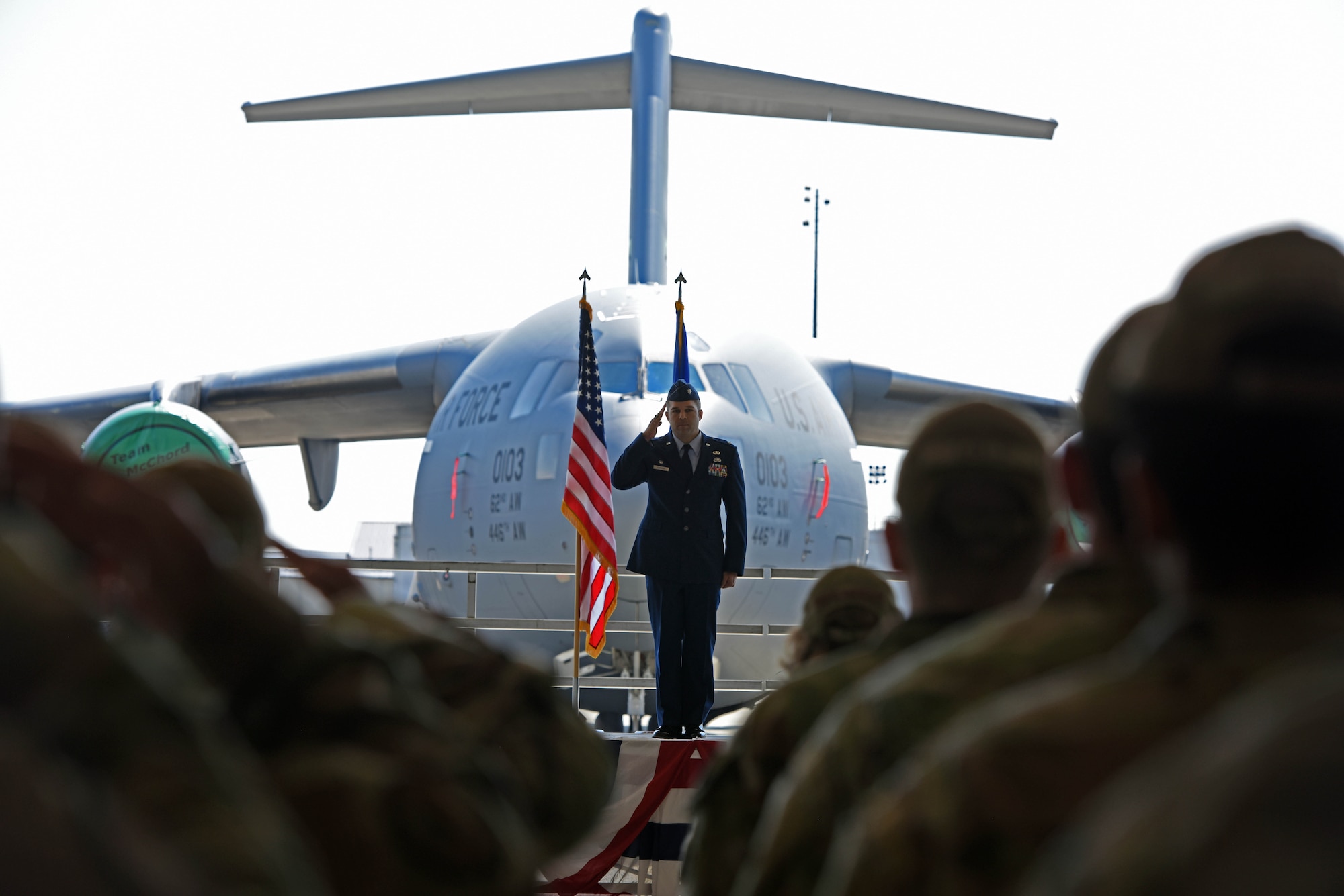U.S. Air Force Lt. Col. Joshua Clifford, 62d Aircraft Maintenance Squadron commander, renders his first salute as commander to 62d AMXS Airmen during a change of command ceremony at Joint Base Lewis-McChord, Washington, June 22, 2023. The mission of the 62d AMXS is to provide safe and reliable aircraft, develop professional Airmen and resilient families, and to foster an environment of empowerment and trust. (U.S. Air Force photo by Staff Sgt. Zoe Thacker)