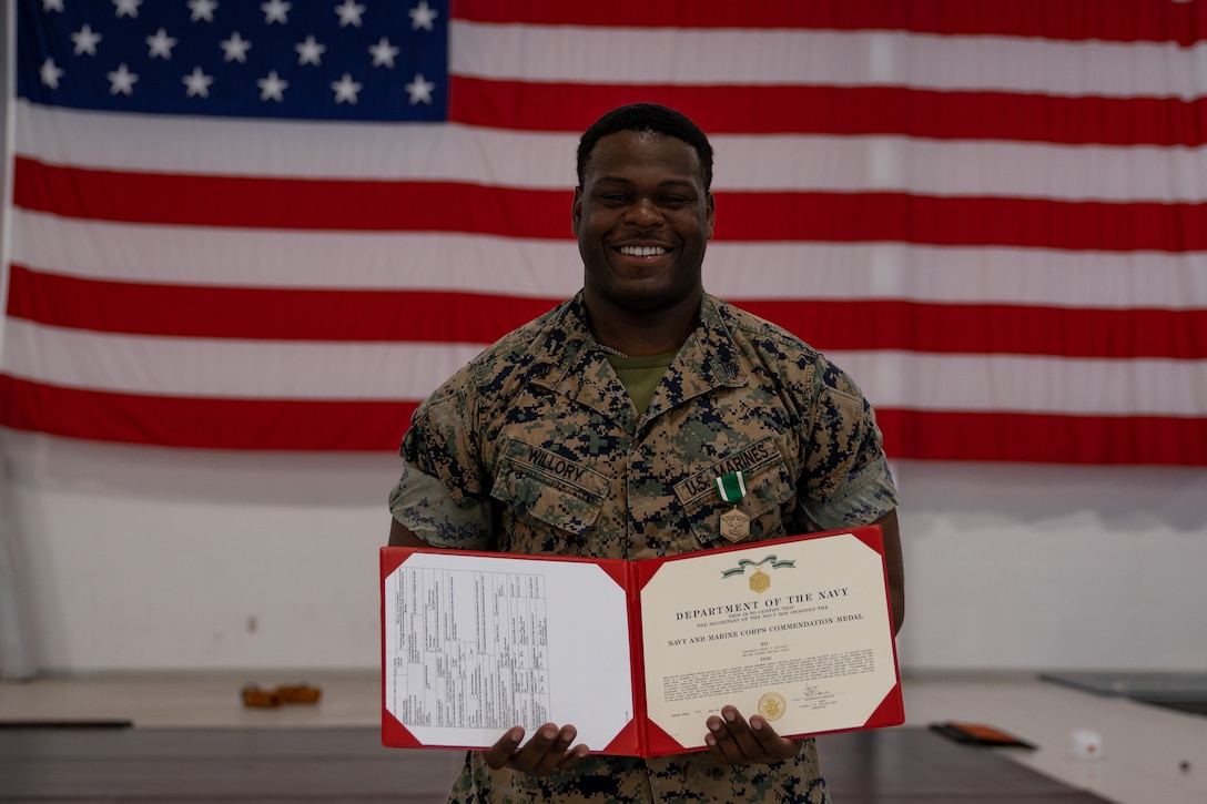 Willory was awarded a Navy and Marine Corps Commendation Medal for his actions in response to a kitchen fire while eating at a restaurant off duty. VMU-2 is a subordinate unit of 2nd Marine Aircraft Wing, the aviation combat element of II Marine Expeditionary Force. (U.S. Marine Corps photo by Lance Cpl. Elias E. Pimentel III)