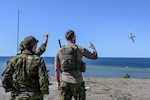 Estonian joint terminal attack controllers perform a panel check of a U.S. Air Force A-10C Thunderbolt II aircraft assigned to the 104th Fighter Squadron, 175th Wing, Maryland National Guard, after a live missile firing at a water range off the coast of Saaremaa, Estonia, June 12, 2023. Maryland and Estonia are celebrating 30 years of partnership through the Department of Defense National Guard Bureau State Partnership Program.