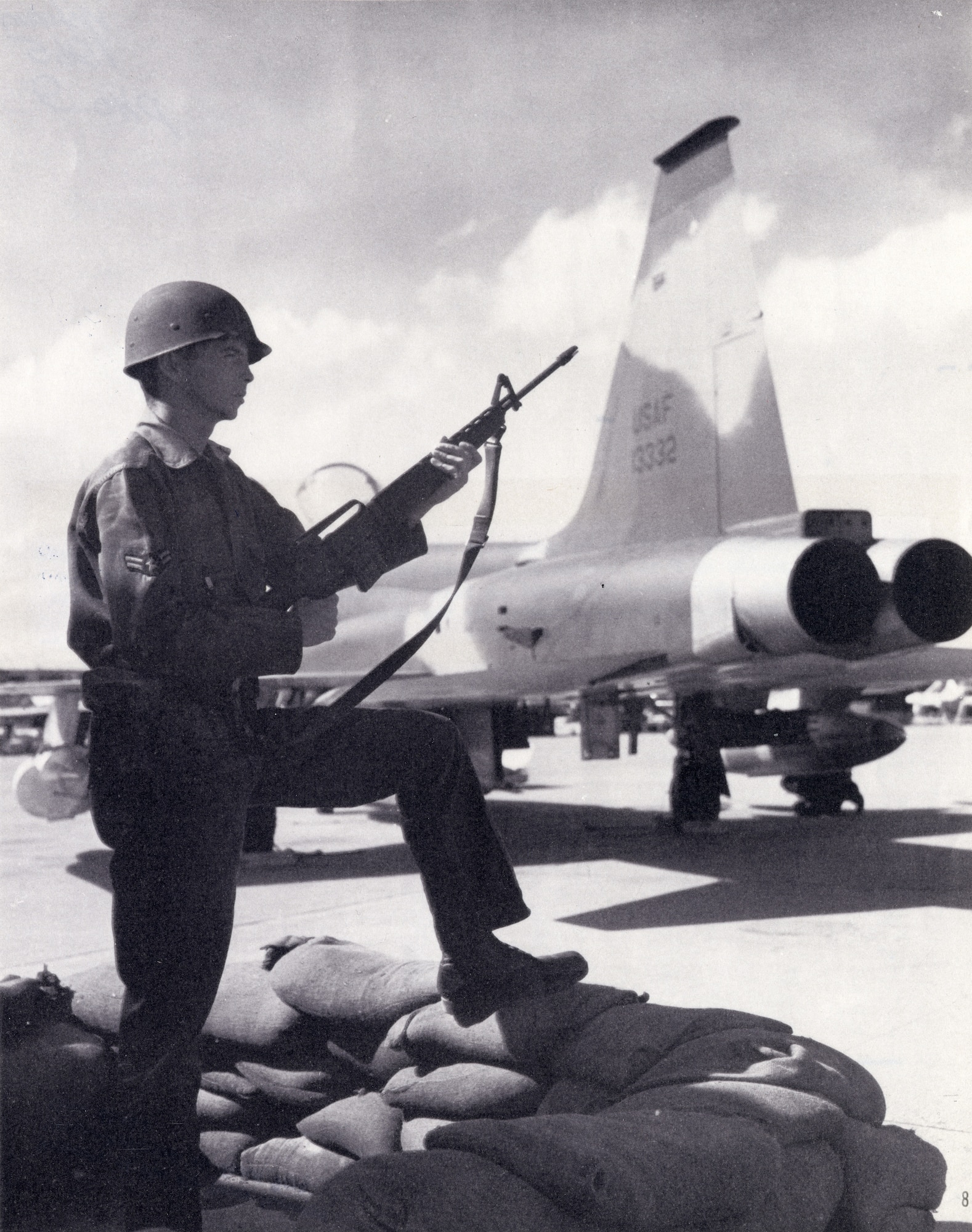 A Security Policeman guards an F-5A Freedom Fighter at Bien Hoa Air Base in the Republic of Vietnam in 1965. Security Police in South Vietnam maintained a constant alert against sabotage attempts by the Viet Cong.