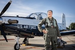1st Lt. Hannah Michitsch is pictured with a T-6 Texan II at Naval Air Station Pensacola