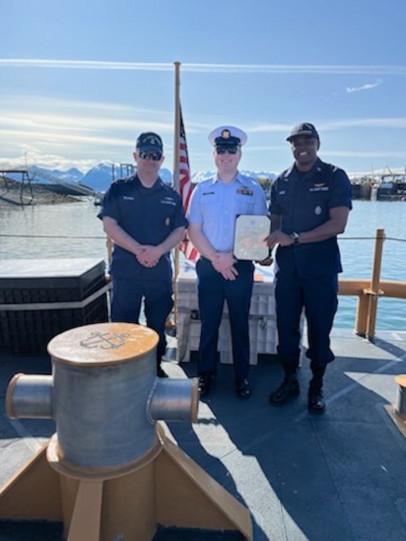 Chief Petty Officer Katie Schreiber (left), Lt. William Singletary, Petty Officer 1st Class Richard Moroge, and Lt.j.g. Leah Schweigert pose aboard Coast Guard Cutter Naushon (WPB 1311) June 3, 2023. Moroge was meritoriously advanced to petty officer 1st class for his outstanding contributions and accomplishments both on and off duty. Coast Guard courtesy photo.