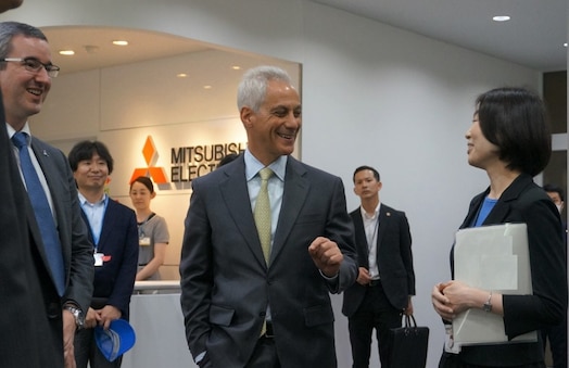  U.S. Ambassador to Japan, Rahm Emanuel, greets Ms. Asako Ueno, executive director, Quasi-Zenith Satellite System, Japanese National Space Policy Secretariat, Cabinet Office, and Maj. Anthony Hughes, Mutual Defense Assistance Office, US Embassy, Tokyo, during a site visit to the Quasi-Zenith Satellite System Hosted Payload in Japan. Photo Credit: Provided by Government of Japan
