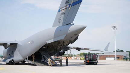 U.S. Airmen with 123rd and 156th Contingency Response Groups and the 172nd and 146th Contingency Response Flights help to load a U.S. Air Force C-17 Globemaster III aircraft assigned to the 172nd Airlift Wing, Mississippi National Guard, with personnel and cargo following exercise Air Defender 2023 at Wunstorf Air Base, Wunstorf, Germany, June 27, 2023. Exercise AD 23 integrated U.S. and allied air power to defend shared values while leveraging and strengthening partnerships to deter aggression worldwide.