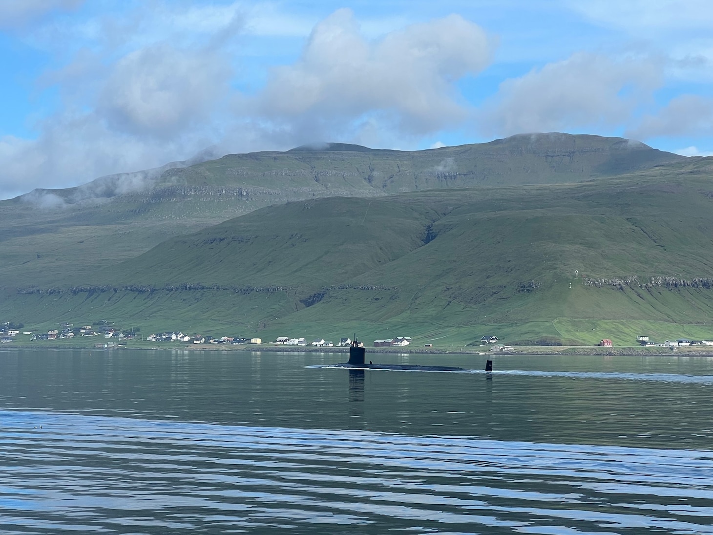 The Virginia-class attack submarine USS Delaware (SSN 791) arrived in Tórshavn for a scheduled port visit, marking the first time a U.S. nuclear powered submarine has moored in the Faroe Islands, June 26, 2023. Delaware, the seventh U.S Navy ship and first submarine named after the first U.S. state of Delaware, is a flexible, multi-mission platform designed to carry out the seven core competencies of the submarine force: anti-submarine warfare; anti-surface warfare; delivery of special operations forces; strike warfare; irregular warfare; intelligence, surveillance and reconnaissance; and mine warfare. (U.S. Navy photo by Cmdr. Michael N. Mowry)
