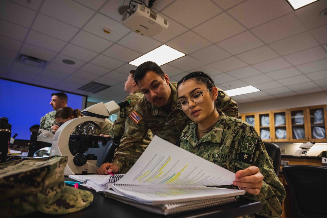 Army and Navy students in the Medical Education and Training Campus Preventive Medicine program examine insects and learn about their relationship to humans, the environment, and other organisms in the entomology laboratory. As part of their training, students are prepared to perform various entomological functions in support of insect and rodent control programs. Graduates are certified in DoD Pesticide Application through the Armed Forces Pest Management Board.