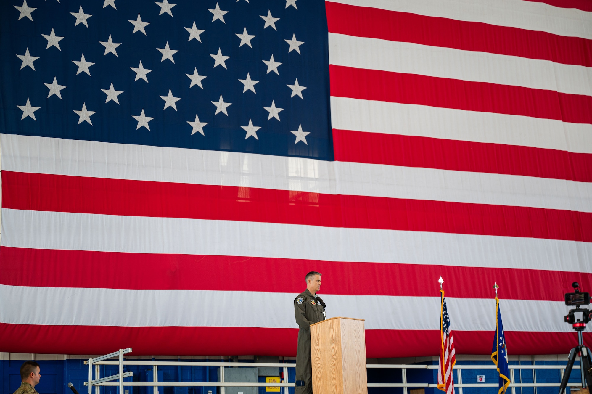 U.S. Air Force Col. Andrew Finkler gives a speech after taking command during a change of command ceremony for the 850th Spectrum Warfare Group at Eglin Air Force Base, Fla., June 23, 2023. Finkler is the second commander for the 850th SWG, which was activated in 2021. (U.S. Air Force photo by 1st Lt. Benjamin Aronson)