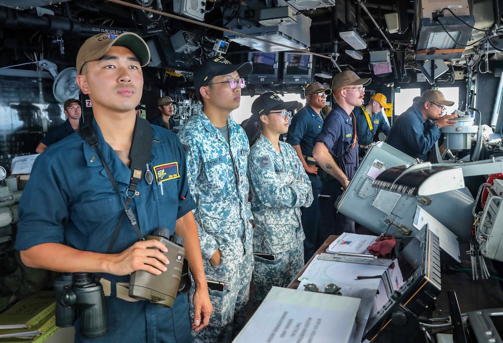 Sailors stand watch aboard USS Shiloh (CG 67) in the Philippine Sea.