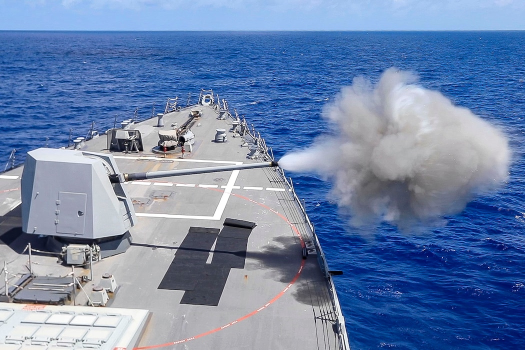 USS John Finn (DDG 113) conducts a live-fire exercise in the Philippine Sea.